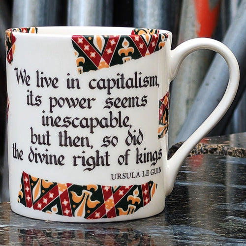 We live in capitalism, its power seems inescapable, but then, so did the divine right of kings - Ursula Le Guin Mug